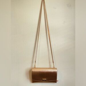 Rose gold Kate Spade crossbody wallet